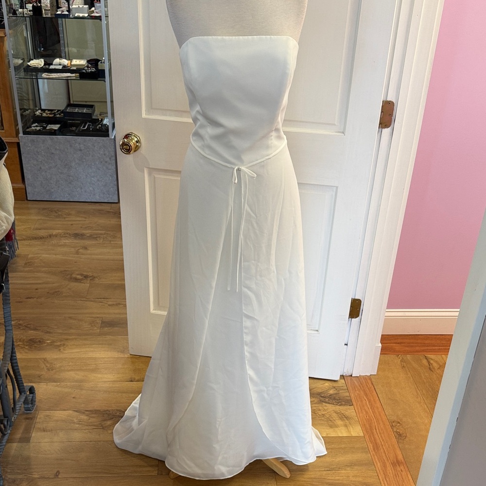Galina strapless soft white wedding gown.  Size 16